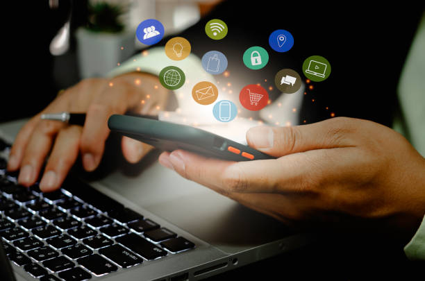 istock Man using phone payment shopping online and network connection icon on hologram virtual screen.Digital marketing sales ideas online. 1337721405
