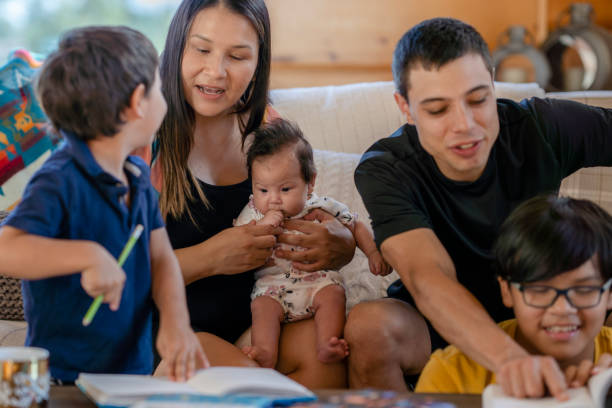 istock Young family spending quality time together at home 1337721774