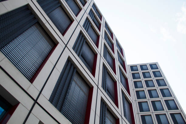 istock Geometric Office Building Side View in the Cityscape 1337725369
