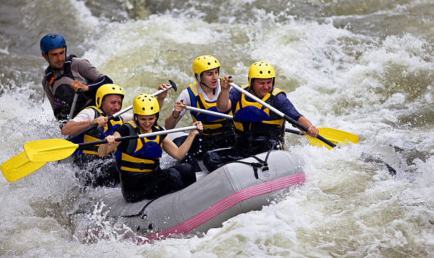 istock Group of people whitewater rafting 133773484