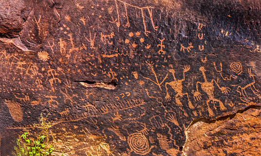 Indian Petroglyphs Newspaper Rock Petrified Forest National Park Arizona. Ancient symbols created between 1499BC and 1000AD scratched out on rocks by Native Americans