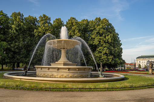 The Jubilee Column is a 30 meter high column, commemorating the 25th anniversary (1841) and the 60th birthday of king Wilhelm I. von Württemberg in 1846. Building started in 1842 after design by architect was Johann Michael von Knapp and in 1846 it was finished. The statues and reliefs were made by the sculptor Theodor Wagner. The statues represent the four estates; three of the four reliefs represent the king's military successes against Napoleon Bonaparte, only one is devoted to a political event. In 1863 a 5 m high statue of Concordia by Ludwig von Hofer was placed on the top.  The Dominant Building is Ministry of Economics, Labor and Tourism Baden-Württemberg as part of the New Palace In Stuttgart.