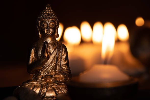 istock image in Buddhist temple next to candles 1337744480