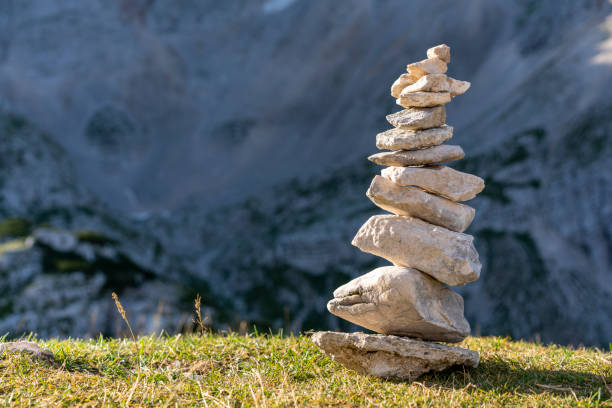 istock Balanced pebble stacks in the Julian Alps, Slovenia 1337756891