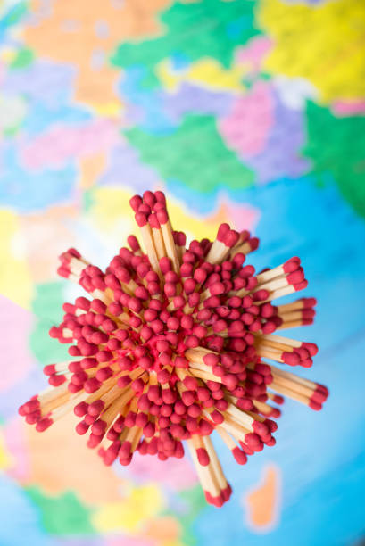 istock Coronavirus,Covid-19 disease cells model make it from matchstick on outbreak and pandemic medical  health risk concepts with world map background 1337758536