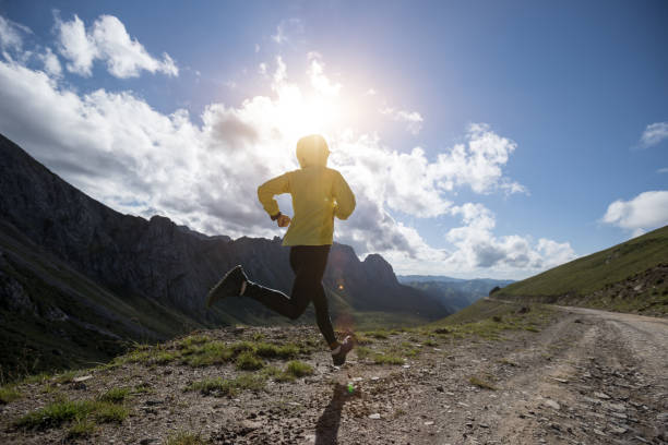istock Young woman ultramarathon runner running at mountain top 1337759973