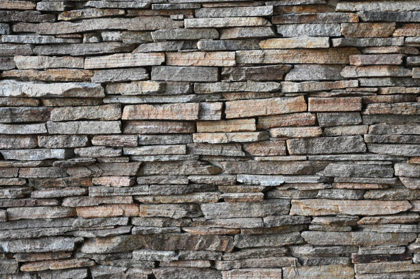 istock Old dirty wall close up. Grunge abstract photo background.  Beautiful stone texture pattern. 1337761149