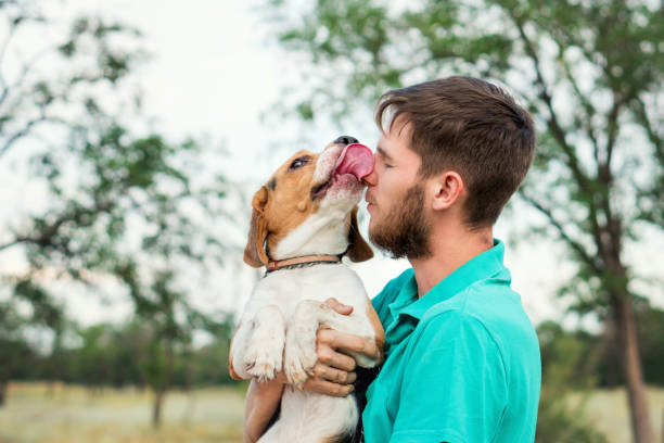istock Portrait owner man with dog 1337765837