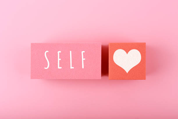 istock Self love minimal creative concept in pink colors against pink background with copy space 1337766683