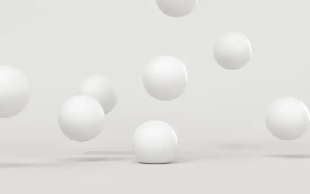 Photo of Bouncing soft balls with white background, 3d rendering.