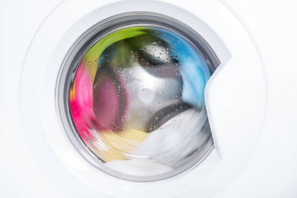 istock Process of cleaning color cloth in washing machine 1337769393
