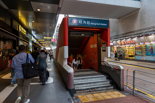 Hong Kong - September 1, 2021 : People at the MTR Mong Kok Station in Kowloon, Hong Kong. Mong Kok is a rapid transit station on the Kwun Tong and Tsuen Wan Line of the MTR system in Hong Kong.