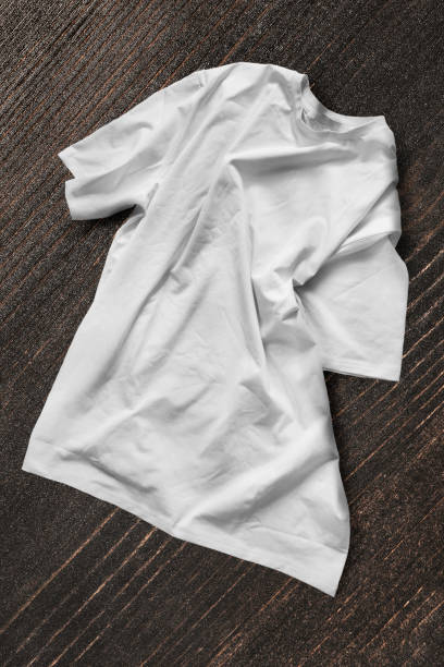 istock T-shirt on wood background 1337773102