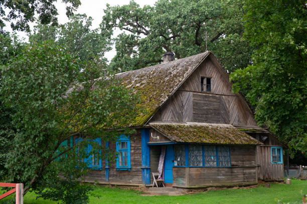 istock Old traditional wooden house and yard 1337782574