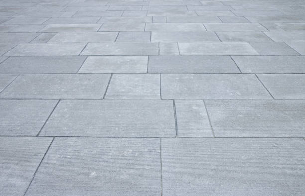 istock New paving made with stone blocks of rectangular shape in a pedestrian zone 1337783526