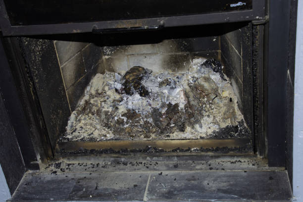 istock indoor fireplace with black ash and shiny soot before cleaning after wood fire 1337784620