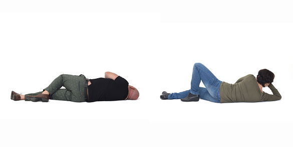 couple lying on the floor on white background
