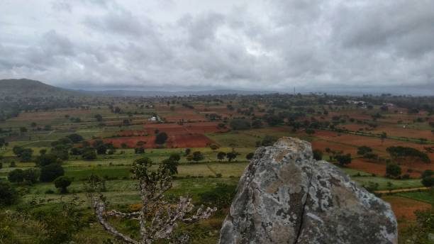 istock a view on the hilltop. a rock with agricultural fields 1337788914