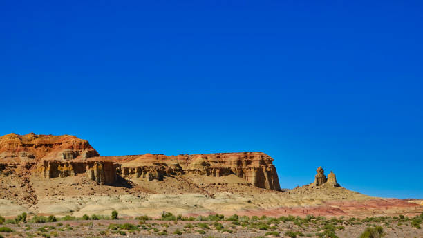 istock Wind eroded square hills, minarets, peaks, Efege mounds. Clean blue sky. 1337792487