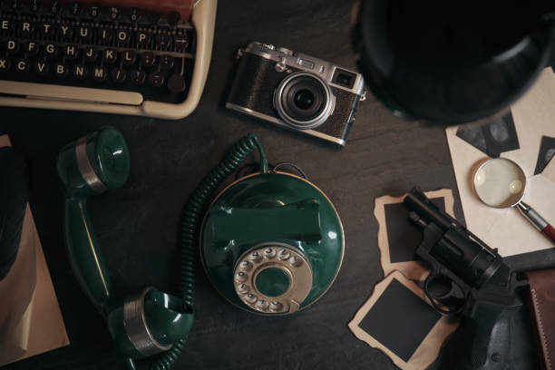 istock Flat lay composition with vintage detective items on wooden table 1337794538