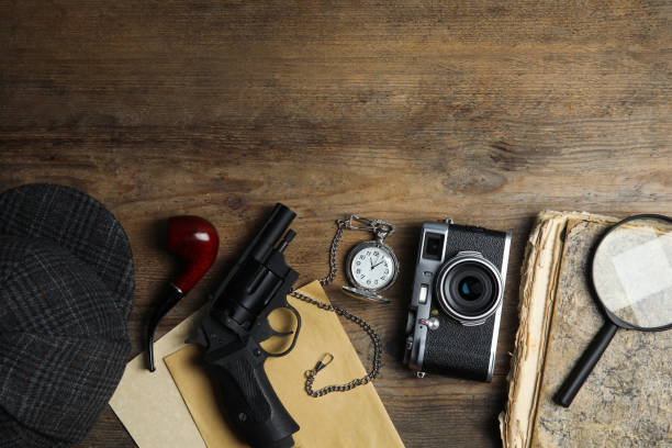 istock Flat lay composition with vintage detective items on wooden background, space for text 1337795423