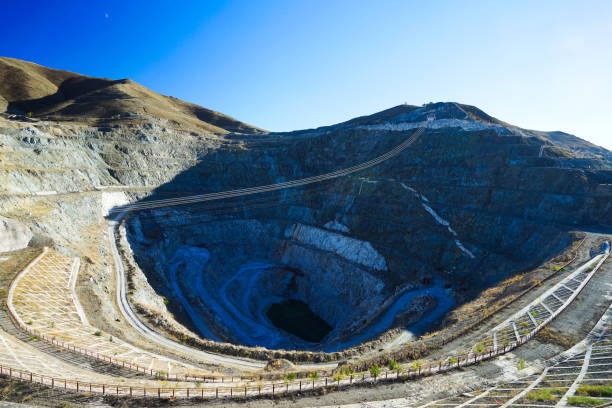 Xinjiang Mines National Park, No. 3 Vein. Round cave entrance. Keketuohai UNESCO Global Geopark(Xinjiang Rare Metals National Mine Park) No.3 Mine Pit. Picturesque natural landscape. Keketuohai Scenic Area. Xinjiang, China. 2018 endangered species stock pictures, royalty-free photos & images