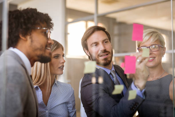 istock Business team working together on meeting, analyzing financial documents in office 1337796144
