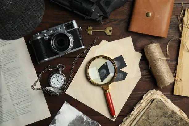 Composition with different vintage items on wooden background. Detective layout