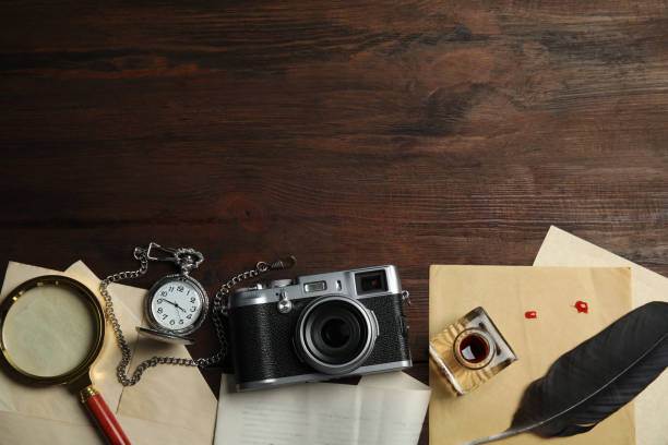 istock Composition with different vintage items on wooden background, space for text. Detective layout 1337796550