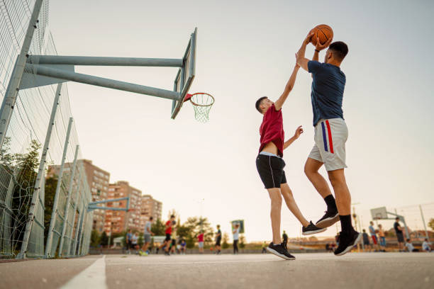 Another day on a basketball court Another day on a basketball court defending sport photos stock pictures, royalty-free photos & images