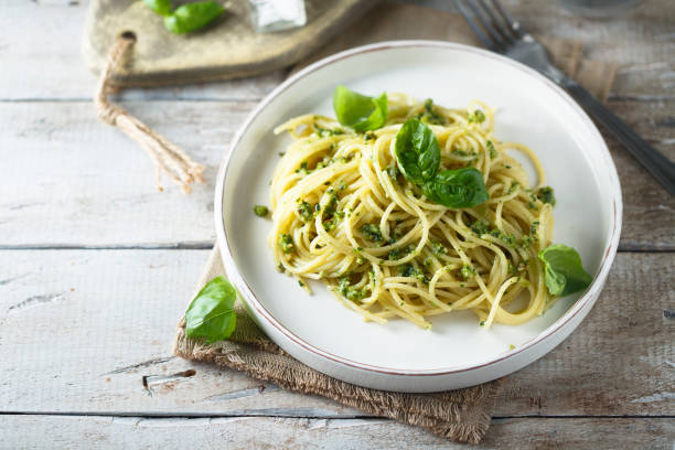 istock Spaghetti with pesto sauce 1337798200