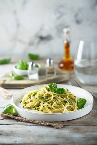 istock Spaghetti with pesto sauce 1337798371