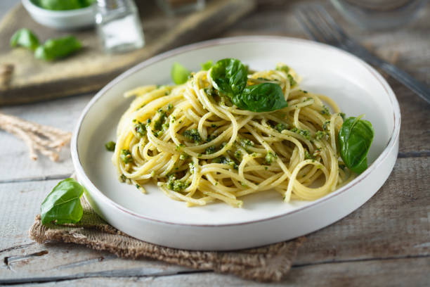 istock Spaghetti with pesto sauce 1337798373
