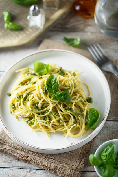 istock Spaghetti with pesto sauce 1337799118
