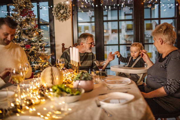 istock Family having Christmas dinner 1337804279