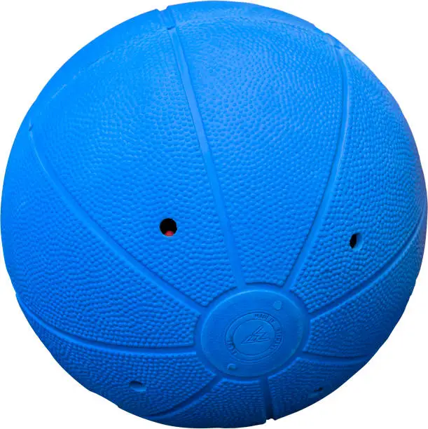 Clipping isolated image of a rubber jingling ball with soundholes and goggles used by disabled and blind athletes in goalball.