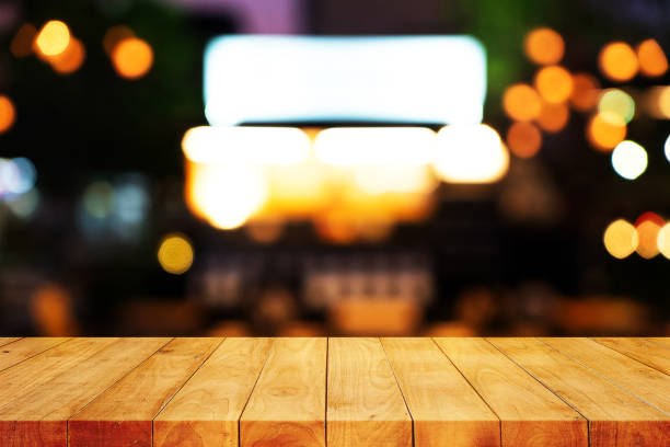 istock 3D rendering,Empty wooden table with Blur Background, for your photo montage or product display, Space for placing items on the table, Mock up for display of product. 1337822422