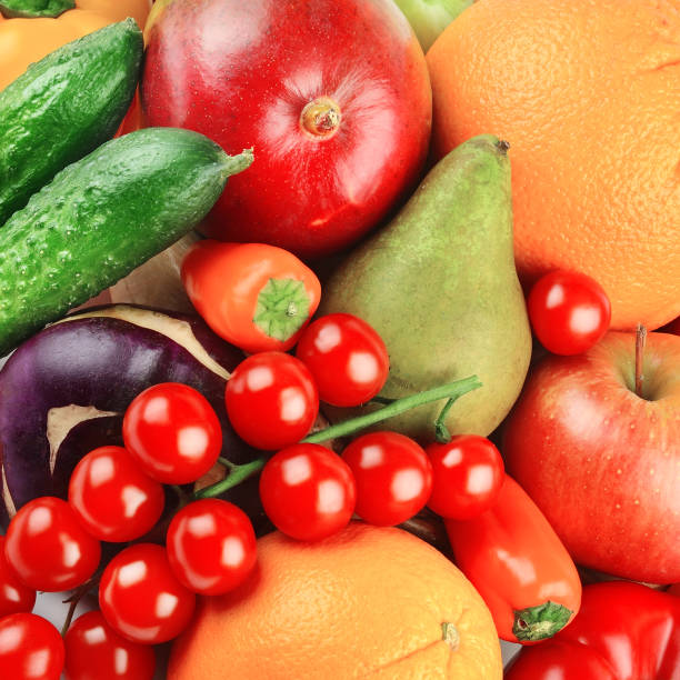 istock Beautiful bright background from various vegetables and fruits. 1337825092