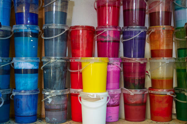 istock Colorful ink paint bottles in a row stacked 1337831891