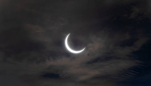 istock Solar eclipse. Full moon or lunar with light on sky in dark at night sky background. Space astronomy. Nature phenomena 1337835611