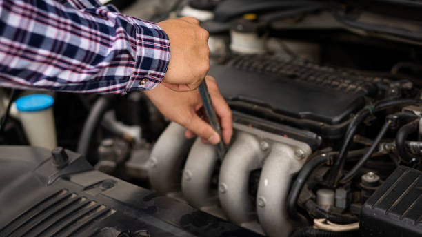 istock Hand holding a wrench while practicing the car and checking the condition before leaving. 1337843300