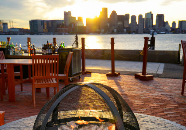 istock Happy hour at sunset with view of Boston skyline. 1337847093
