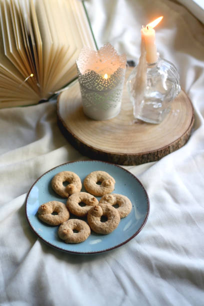 istock Cookies, Book and Candles 1337854944