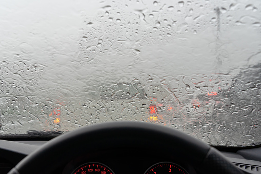 Traffic jam while driving in heavy rain