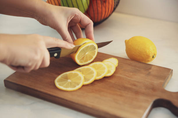 istock Woman cooking at table in kitchen, closeup 1337870012