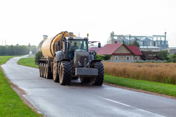 istock A tractor with a modern fertilizer trailer 1337875534