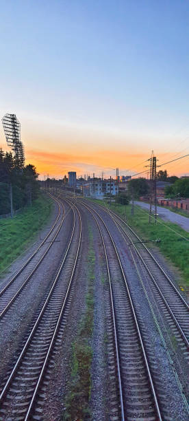 istock Railroad tracks into sunset horizon in Latvia 1337878765