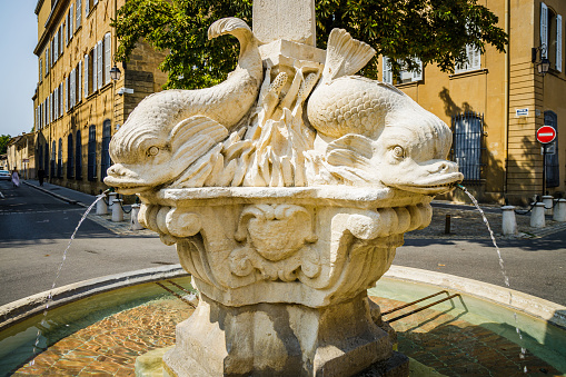 Four dolphins fountain on the Place des Quatres Dauphins in Aix en Provence, France
