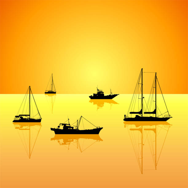 yachten bei sonnenuntergang - silhouette nautical vessel sea morning stock-grafiken, -clipart, -cartoons und -symbole