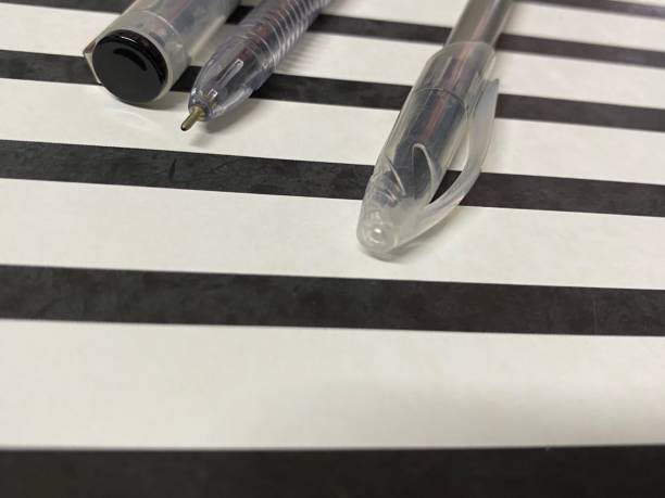 istock Top view of black and white stripe clipboard and office objects. 1337891968
